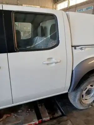 Автозапчасти б/у задняя левая дверь за mazda bt-50 (un) doble cabina active 4x4 ссылки oem iam 