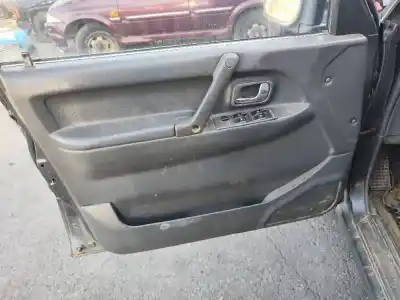 Автозапчасти б/у обивка левой передней двери за mitsubishi montero v20 v40 2800 td glx 5-ptas. ссылки oem iam mb777388