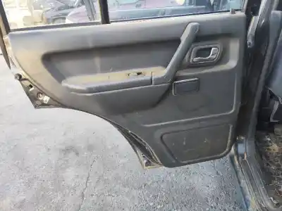 Автозапчасти б/у обивка задней левой двери за mitsubishi montero v20 v40 2800 td glx 5-ptas. ссылки oem iam mb784186  
