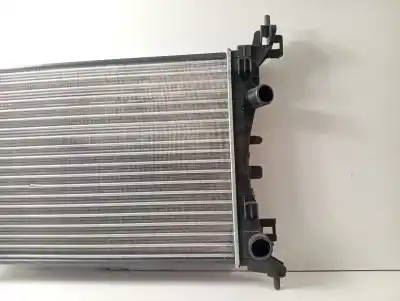 Peça sobressalente para automóvel em segunda mão Radiador De água por OPEL CORSA D Sport 95 CV / 70 KW Referências OEM IAM 11437002408  