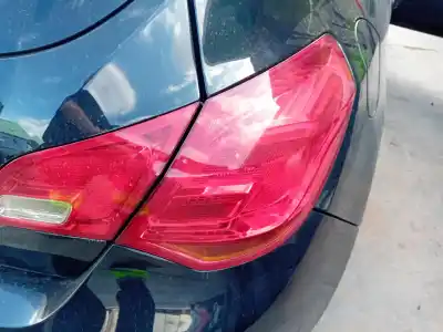 Pièce détachée automobile d'occasion FEU ARRIÈRE DROIT pour OPEL ASTRA J BERLINA 5P  Références OEM IAM 13306454  