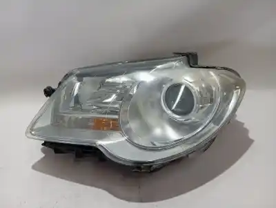 Tweedehands auto-onderdeel LINKER KOPLAMP voor VOLKSWAGEN TOURAN (1T2)  OEM IAM-referenties 0301233201  