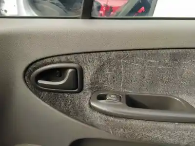 Автозапчасти б/у выключатель переднего правого окна за renault scenic (ja..) f9q732 ссылки oem iam 