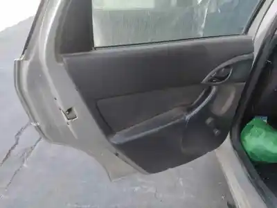 Автозапчасти б/у обивка задней левой двери за ford focus familiar (cak) ffda ссылки oem iam 