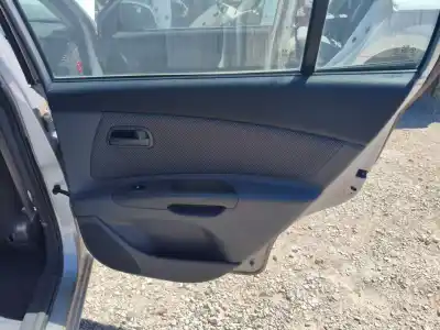 Автозапчасти б/у обивка задней правой двери за kia rio (jb) d4fa ссылки oem iam 