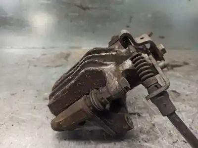 Автозапчастина б/у задній лівий гальмівний супорт для skoda rapid 1.2 8v tsi посилання на oem iam 6r0615423  