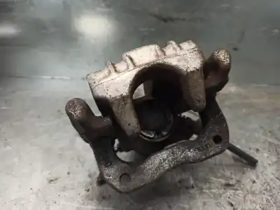 Автозапчастина б/у задній лівий гальмівний супорт для skoda rapid 1.2 8v tsi посилання на oem iam 6r0615423  