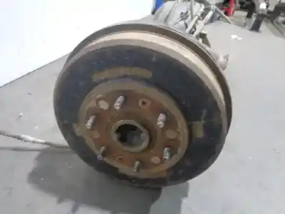 Автозапчастина б/у задня вісь для mitsubishi l 200 (ka0/kb0) 2.5 di-d cat посилання на oem iam 3711a034 burra 9 tambor 6 agujeros