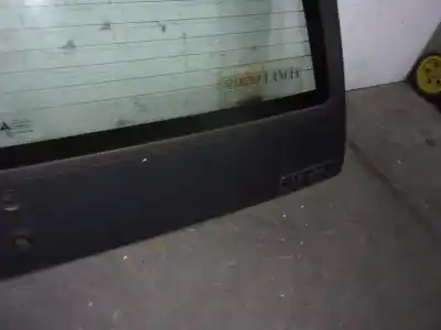 Second-hand car spare part tailgate for lancia y10 1.1 cat oem iam references 91387572  