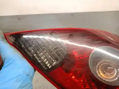 Автозапчасти б/у правый задний фонарь за opel corsa d (s07) 1.3 cdti (l08, l68) ссылки oem iam 13242812 89075557a valeo 1222150