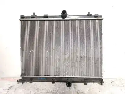 Pièce détachée automobile d'occasion RADIATEUR D'EAU pour OPEL CORSA F  Références OEM IAM 9825332380 TP2221124490 DENSO 