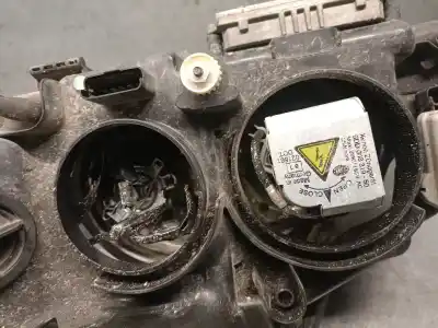 Second-hand car spare part right headlight for renault espace iv (jk0/1_) 2.0 turbo (jk0a, jk0b, jk0n) oem iam references 15566000re  7701053976