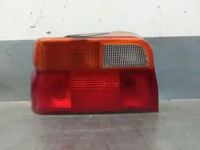Pièce détachée automobile d'occasion FEU ARRIÈRE GAUCHE pour FORD ESCORT V (AAL, ABL) 1.3 Références OEM IAM 1052429  